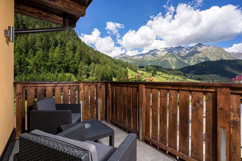 Balcony with a view from the panorama room in Hotel Das Schlossberg in Tyrol