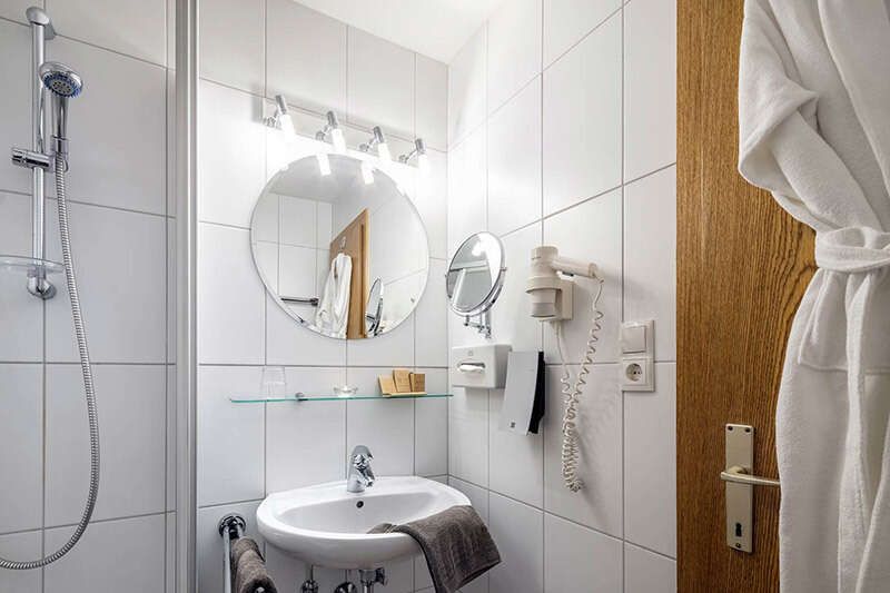 Bathroom in the single room in Hotel Das Schlossberg