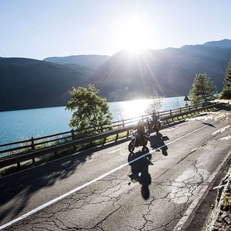 Motorcyclists at Lake Reschen in Tyrol