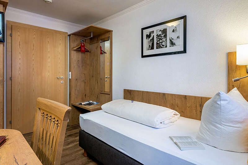Single room with desk in Hotel Das Schlossberg in Tyrol