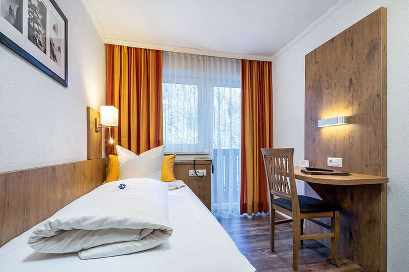 Single room with balcony in Hotel Das Schlossberg